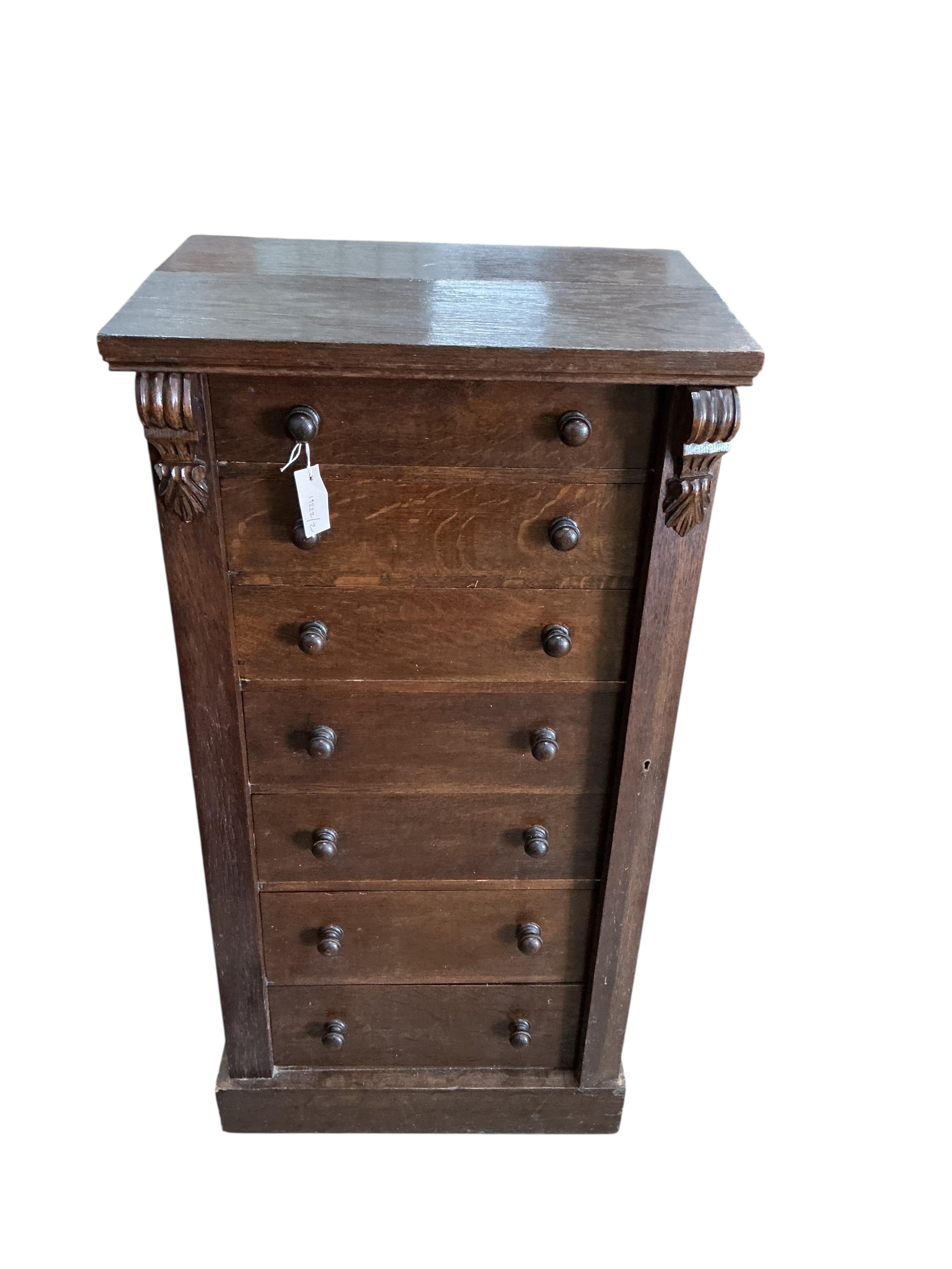 A late Victorian oak Wellington chest, width 61cm, depth 43cm, height 121cm